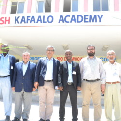 Turkish Ambassador Olgan Baker agrees Kafaalo Group to takeover and manage Turkish Schools in Somalia. Kafaalo Group with Turkish Ambassador.